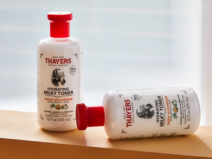 Picture of two Thayers toners laying on a wooden beam