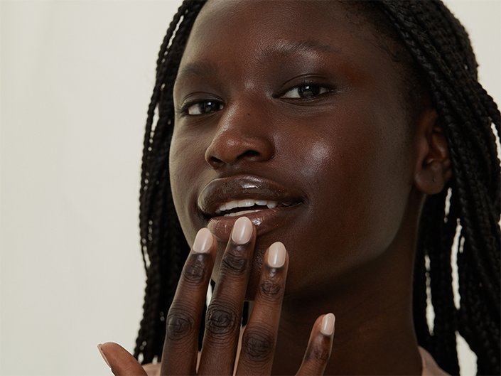 person touching their lips