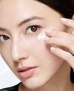 A person with a lotion cream on their face